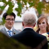 wedding ceremony through a tree